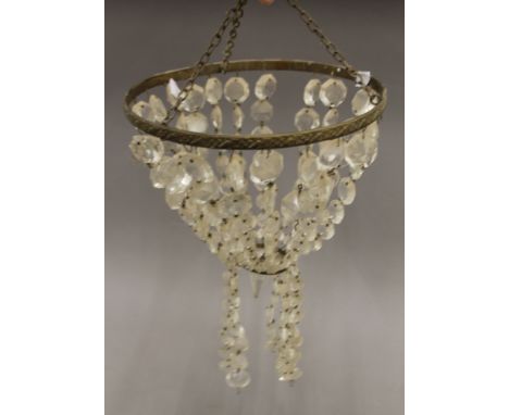 A glass drop chandelier. 25 cm diameter. 