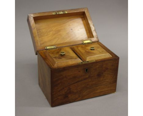A Victorian walnut tea caddy. 20 cm wide.