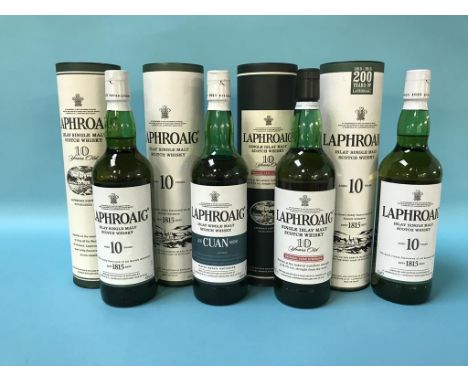 Four bottles of Laphroaig 10 year old Scotch whisky
