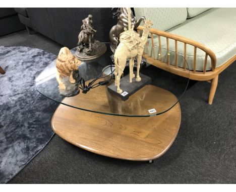 An Ercol glass top coffee table, 90cm wide