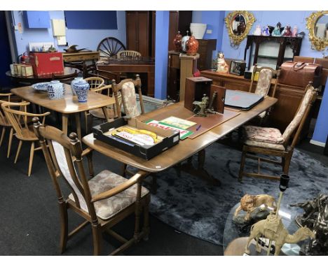 An Ercol table and four chairs