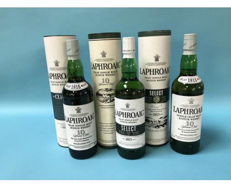 Three bottles of Laphroaig 10 year old Scotch whisky