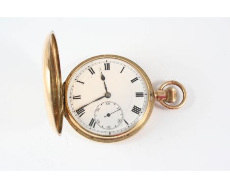 A 9CT. GOLD FULL HUNTING CASED POCKET WATCH the white enamel dial with Roman numerals and subsidiary seconds dial, both cases