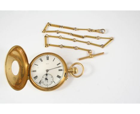 AN 18CT. GOLD HALF HUNTING CASED POCKET WATCH the white enamel dial numbered 8655, with Roman numerals and subsidiary seconds