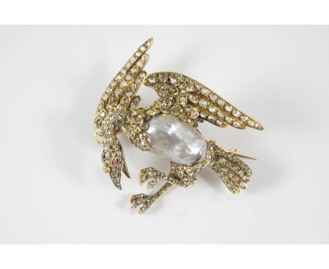 A LATE 19TH CENTURY DIAMOND AND PEARL BIRD BROOCH the body formed with an untested pearl, with graduated old-cut diamonds set