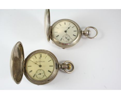 A METAL FULL HUNTING CASED POCKET WATCH BY ELGIN NATL. WATCH CO. the signed white enamel dial with Roman numerals and subsidi