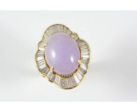 A LAVENDER JADE AND DIAMOND CLUSTER RING the oval-shaped lavender jade cabochon is set within a surround of baguette-cut diam