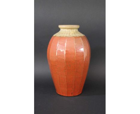 MIKE DODD - LARGE STUDIO POTTERY VASE a large cut sided stoneware vase, the body with an orange and brown speckled glaze and 