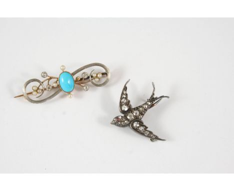 A VICTORIAN DIAMOND SWALLOW BROOCH set overall with graduated rose-cut diamonds, with cabochon ruby eye, in silver and backed