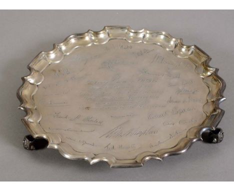 LARGE SILVER SALVER - CERAMIC INTEREST a large silver salver with pie crust edge and scroll feet, engraved to the centre To H