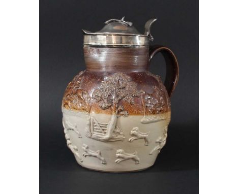 ENGLISH SALTGLAZED STONEWARE AND SILVER MOUNTED JUG, early 19th century, applied with a hunting scene, windmill and a toper, 