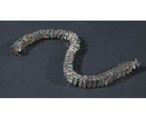 •AMANDA COLEMAN  SILVER NECKLACE. Formed from square section links in the shape of wildlife, vehicles and other motifs, some 