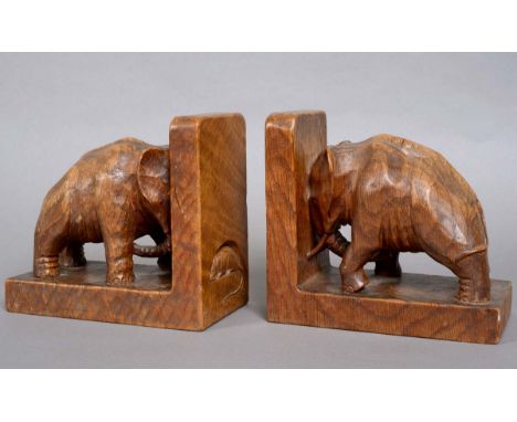 RARE MOUSEMAN BOOKENDS - ROBERT THOMPSON OF KILBURN a rare pair of oak Mouseman book ends in the form of Elephants, one with 