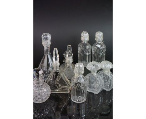 Collection of 20th Century glass including Eleven decanters and stoppers, two cut glass tankards, a footed cut glass bowl, a 