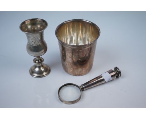 Silver Hallmarked Handled Magnifying Glass, 11cms long together with a Small Silver Vase stamped 84 and a White Metal Beaker 