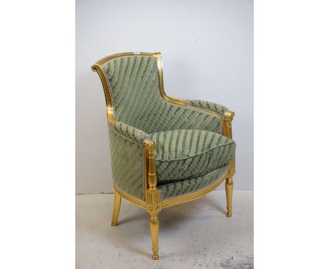 French Style Armchair, the show frame with a gilt / gold finish, green upholstery with a cushion seat, 91cms high x 67cms wid