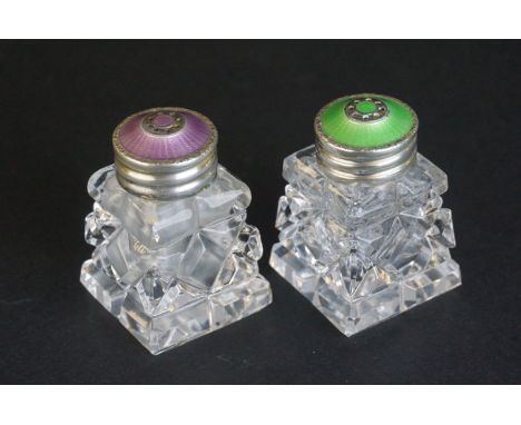 Pair of Norwegian Sterling Silver and Cut Glass Pepperettes, one lid set with Purple Guilloche Enamel and the other with Gree