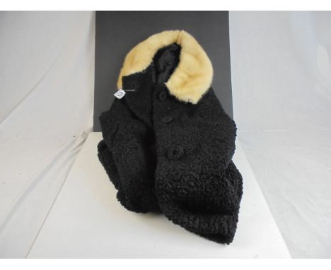 Michel Gouzik vintage Astrakhan 3/4 length coat with blond mink fur collar, three large textured repeating pattern buttons 