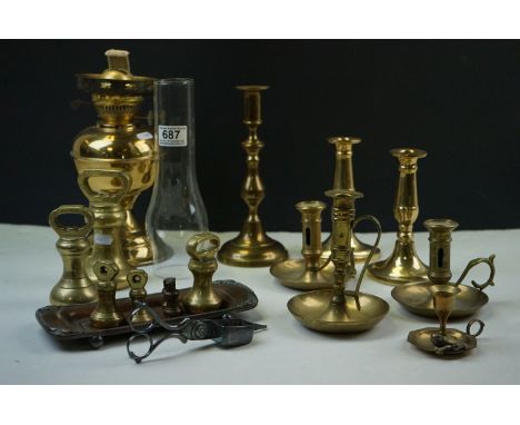 A set of antique brass bell weights together with an oil lamp, a pen tray, candle sticks etc. 