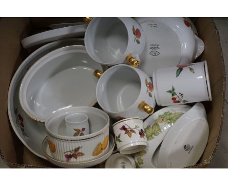 A large quantity of Worcester Evesham dinnerware to include Ramekins tureens serving dishes etc. 
