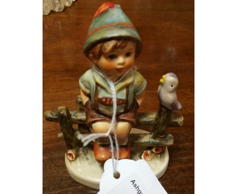 A Goebel Figure of a Boy.