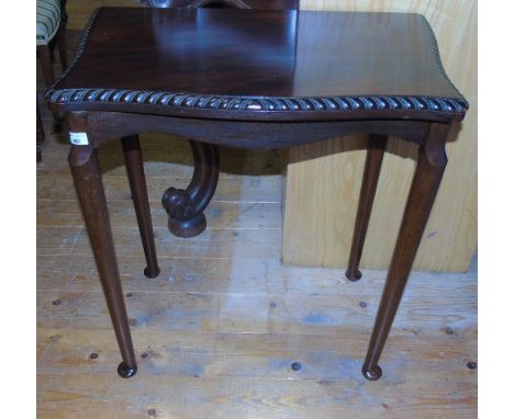 An Edwardian Mahogany Foldover Card Table; with rope edge.