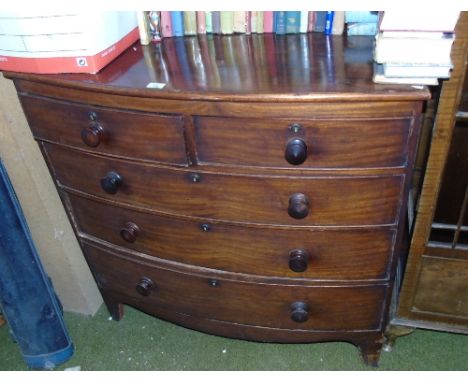 A 19th Century Mahogany Bow Front Chest of Drawers; with two short and three long drawers, 103cm wide 52cm deep 104cm high, a