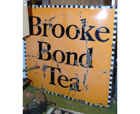 A Brooke Bond Tea Square Enamel Advertising Sign; black lettering on orange background, with black and white chequered border