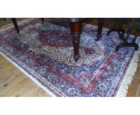 An Ivory Ground Kashmir Carpet - Medallion Design. 380 x 280.