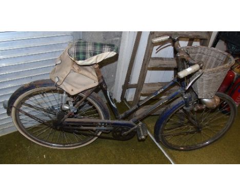 A Vintage Ladies BSA Bicycle; with front wicker basket.