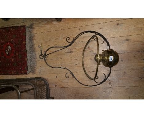 A 19th Century Hanging Oil Light, lacking shade.