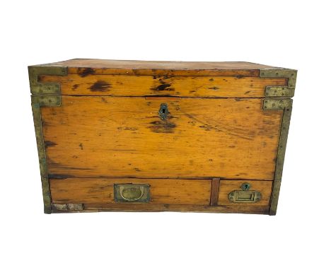 Early 20th century waxed pine travelling trunk or chest, brass bound, rectangular hinged lid, fitted with two small drawers t