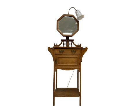 Late 19th to early 20th century oak washstand, the raised back with octagonal mirror with bevelled plate, rectangular top fit