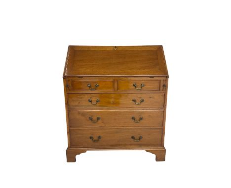 Georgian design mahogany bureau, fall-front enclosing fitted interior with satinwood strung drawers, above two short and thre