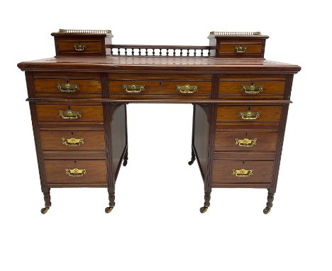 Maple &amp; Co - Edwardian mahogany twin pedestal desk, the raised back with spindle gallery and open shelf to centre flanked