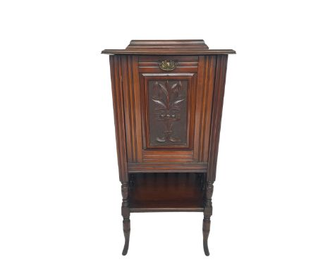 Edwardian walnut fall-front music cabinet, rectangular top with raised back, moulded and carved floral front panel concealing