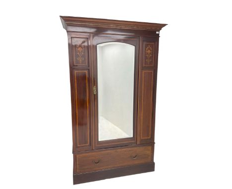 Edwardian inlaid mahogany single wardrobe, projecting cornice over chequerboard frieze, central door with arched bevelled mir