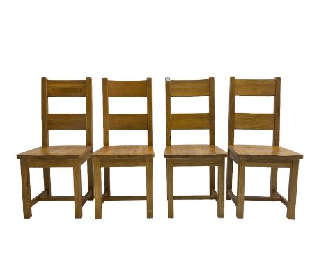 Set four light oak dining chairs, high back over panelled seat. raised on square supportsDimensions: Height: 108cm  Length/Wi