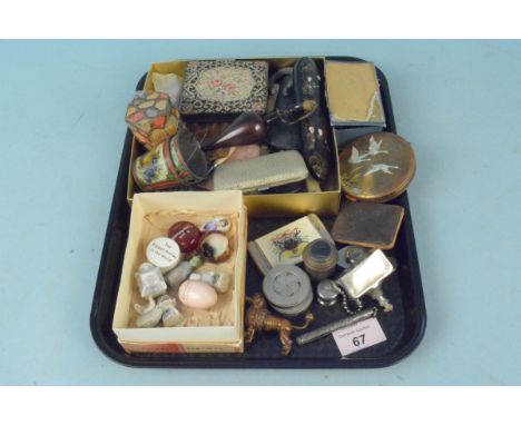 Items of interest including a metal poodle tape measure, a white metal table lighter, compact, compasses etc