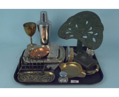 Assorted metal wares to include vintage ash trays, cast iron book stand, plated cocktail shakers, hip flask etc