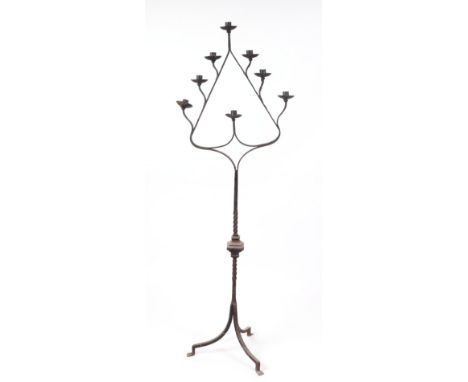Ecclesiastical interest:  A wrought iron Gothic Revival style eight-branch candle stand, 156cms high.Condition ReportThere is