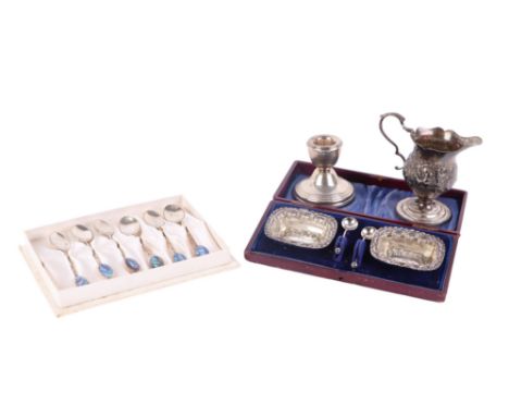 A pair of late Victorian silver salts with matching spoons, Birmingham 1899, 22g, cased; together with a silver milk jug, 189