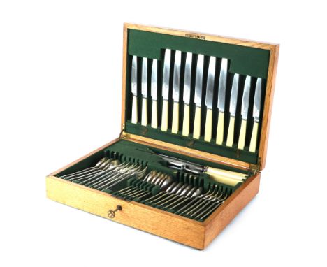 A Roberts & Belk silver plated six-person canteen of cutlery in a fitted oak case.