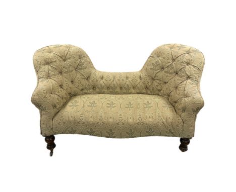 A Victorian button backed sofa on turned front supports, 157cms wide.Condition ReportThe back left caster is missing; the fro