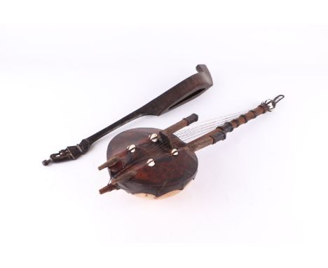 An African gourd stringed instrument, approx 55cms long; together with another harp type instrument, 50cms long (2).