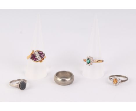 A group of five silver and yellow metal ladies and gentleman's dress rings.