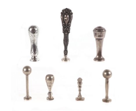 A small collection of Victorian desk seals, some with silver handles.