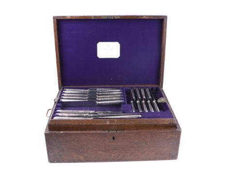 A twelve-person silver plated Old English pattern table service, incomplete, contained within a Harman & Co. Ltd, 177 New Bon