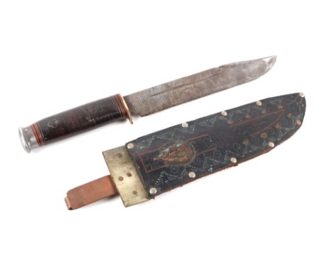 A Bowie type sheath knife in a tooled leather scabbard, 40cms long.