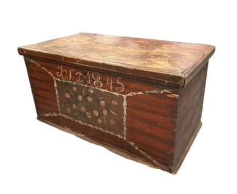 A pine blanket box or trunk with folk art painted decoration, 97cms wide.